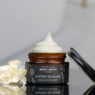 organic whipped squalane next to flowers and slanted cap