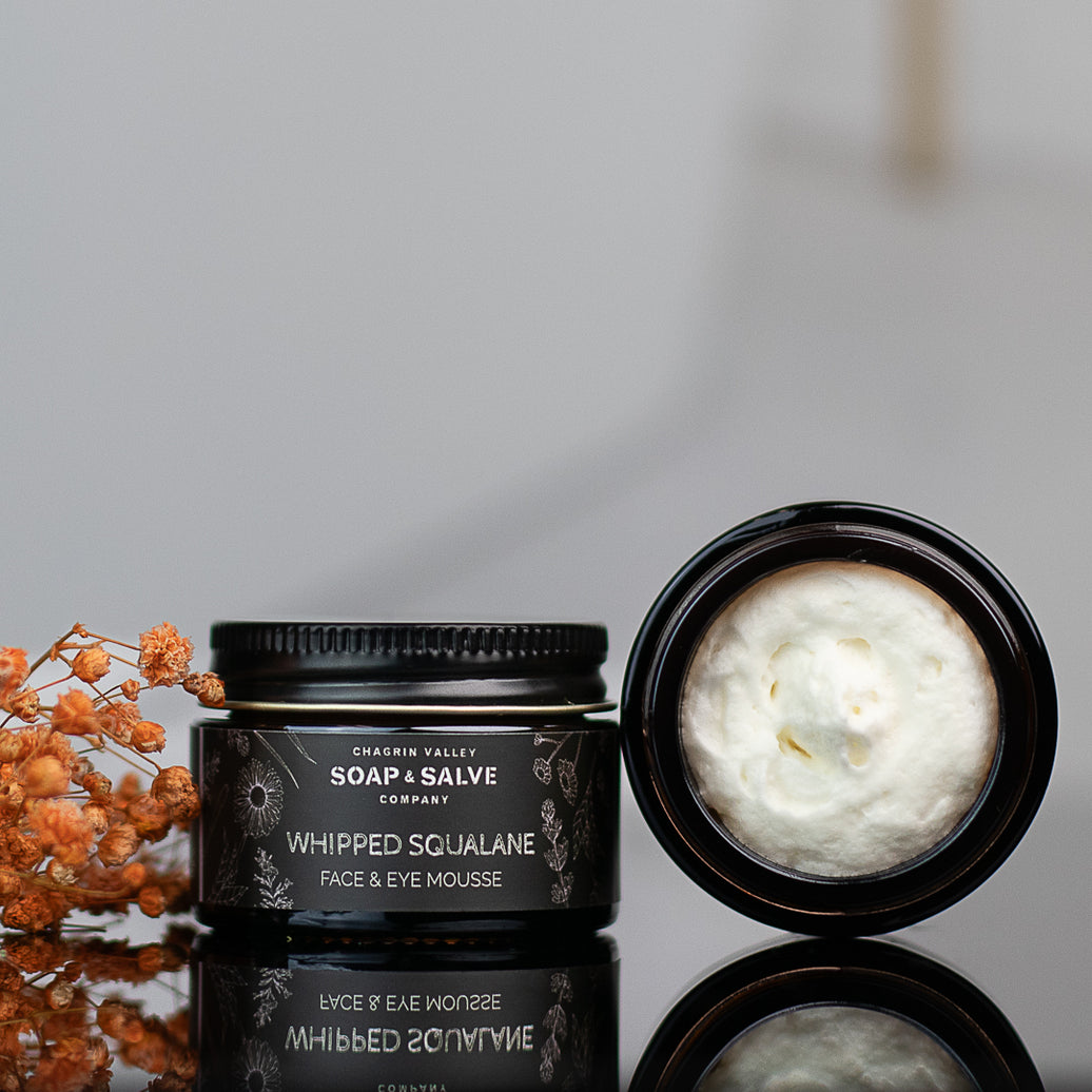 organic squalane side view next to full jar of whipped squalane