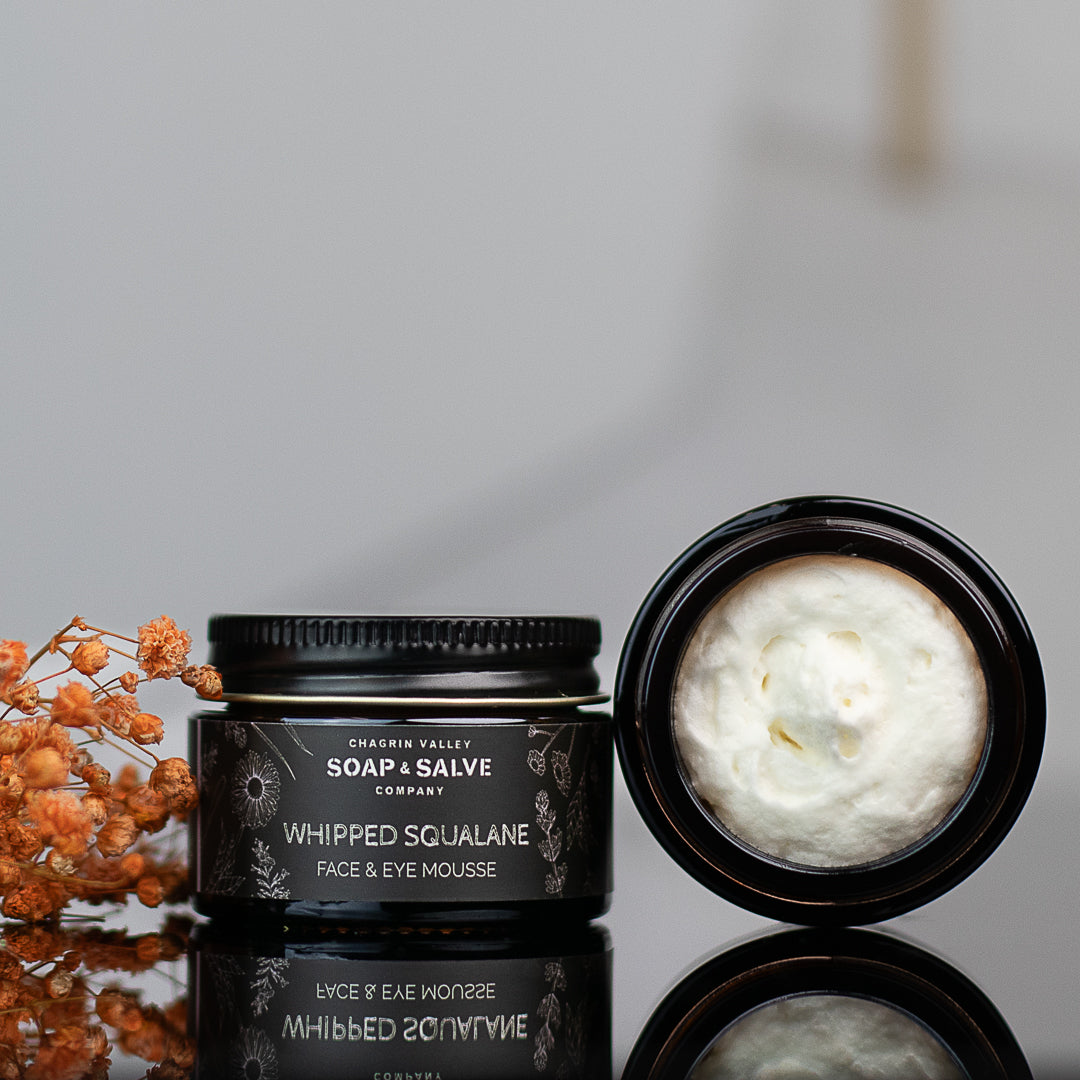 organic squalane side view next to full jar of whipped squalane
